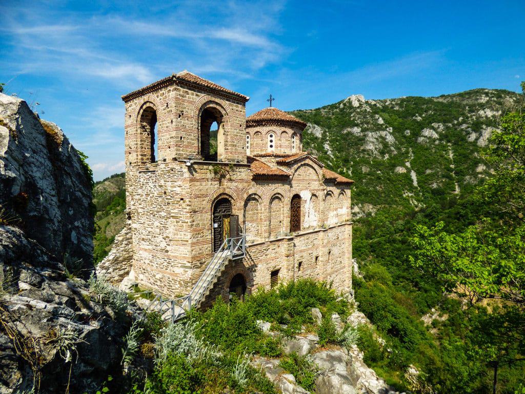 The remains of the church of Asen's Fortress perched atop a sheer cliff